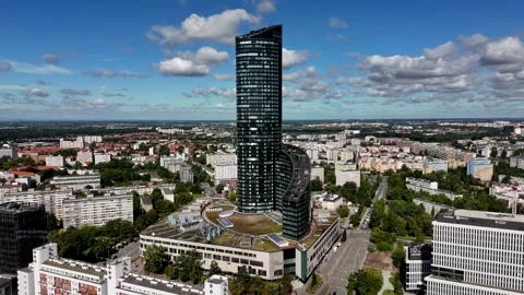 Drone Orbit Around Modern City Skyscraper on a Clear Sunny Day Stock Footage 321306186