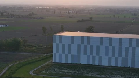 Drone orbit around NewCold automated cold storage facility and logistics site Stock Footage 334360948