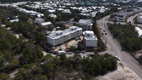 Drone orbit around the newly built residential building complex near the 30A Stockbeeldmateriaal 331067562