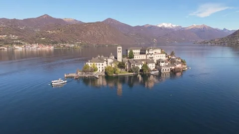Drone Orbit Around San Giulio Island And Departing Ferry On Lake Orta, Italy Video stock 334176853