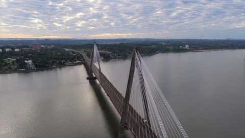 Drone Orbit Around San Roque Gonzalez International Bridge at Sunrise Stock-Footage 337434016
