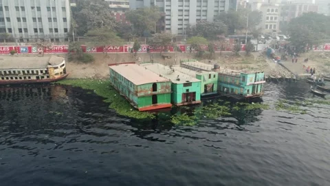 Drone Orbit Around Ship Hotels and Wooden Boat Dock on Buriganga River Stock Footage 327356821