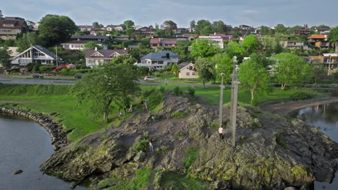 Drone orbit around Sverd i Fjell monument with Stavanger neighborhood nearby. Stock Footage 328131394