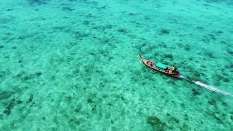 Drone Orbit Around Thai Longtail Boat in Turquoise Water Bamboo Island Stock Footage 331145027