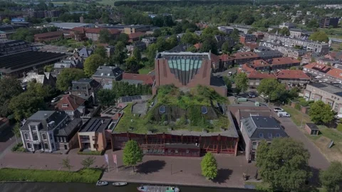 Drone orbit around theater building in Sneek Stock Footage 343839564