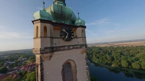 Drone orbit around tower in Mělník, descent to town street Stock Footage 311697397