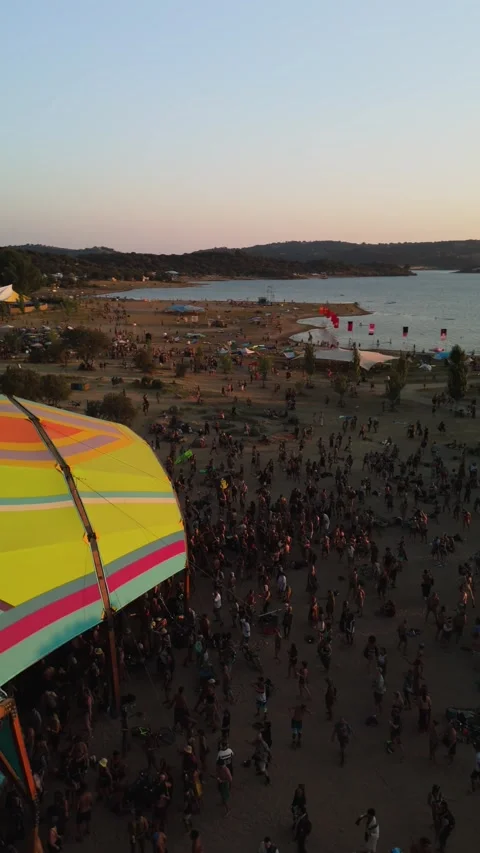 Drone orbit ascend shows dancers at Alchemy Circle, sunset over Idanha-a-Nova Stock Footage 314261499