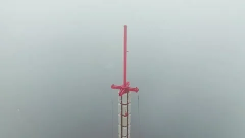 Drone Orbit Away From Riga TV Tower Above Daugava River In Dense Fog Latvia Stock Footage 334745502