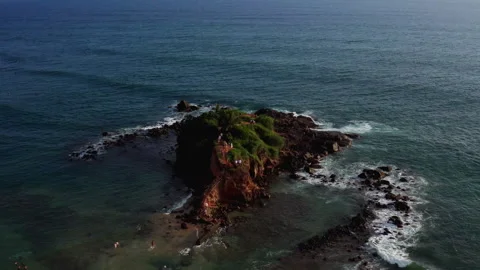 Drone orbit flight around Parrot Rock Island in Mirissa Stock-Footage 316751582