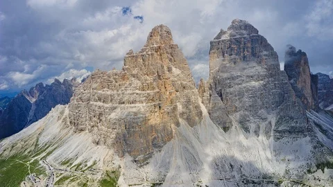 Drone orbit hyperlapse of a mountain peaks in summer Tre Cime in Italy Stock Footage 115510109