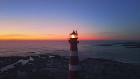 Drone Orbit of Lighthouse During Sunset, Frøya Island Norway Stock Footage 317319364