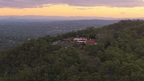 Drone Orbit of Mount Coot-tha Summit Lookout at Sunset Over Brisbane Hinterla Stock Footage 338337126