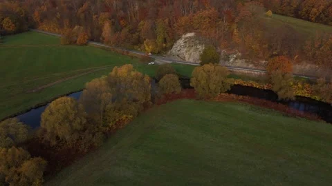 Drone Orbit Over Autumn Forest and River Stock Footage 321292460