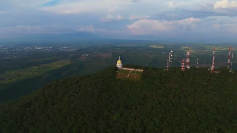 Drone Orbit Over La Cumbre, Colima, Showcasing Cityscape and Mountains at Sunset Stock Footage 292989193