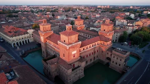 Drone orbit over the moat of Castello Estense at sunrise, Ferrara Stock Footage 346288024