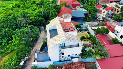 Drone orbit over villa featuring private hot spring thermal bath in Ba Vi 4K Stock Footage 340748008