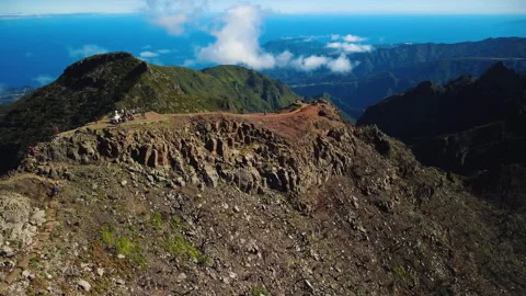 Drone orbit of Pico Ruivo summit and hikers at the highest peak, Madeira Vídeos de archivo 328640486