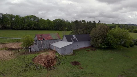 Drone orbit quebec farmhouse in spring, 4k Stock Footage 91153835