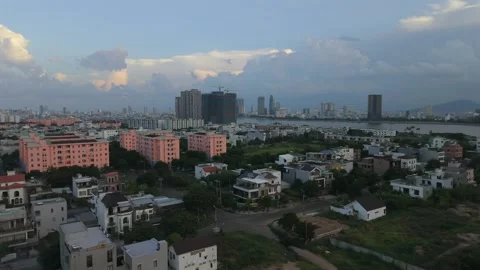 Drone Orbit Revealing Da Nang Skyline and Bridge at Sunrise Stock Footage 340458295