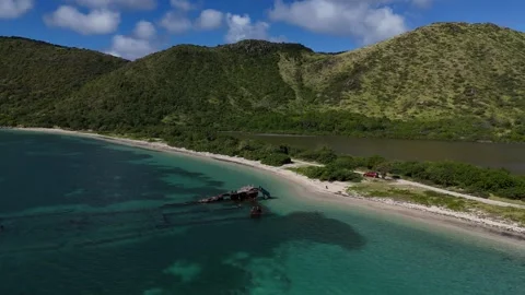 Drone orbit shipwreck - St Kitts Major's Bay  Stock Footage 325752089