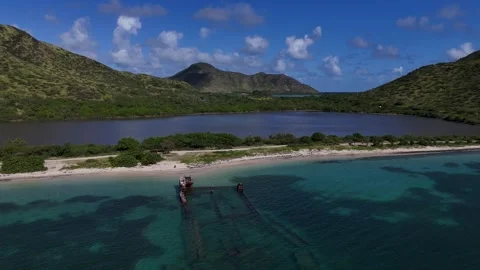 Drone orbit shipwreck - St Kitts Major's Bay Stock Footage 325752132