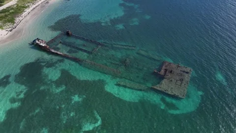 Drone orbit shipwreck - St Kitts Major's Bay Stock Footage 325752144