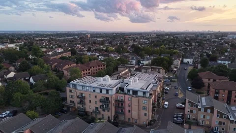 Drone orbit shot around a residential building in Romford, England, revealing a Stock-Footage 344019817