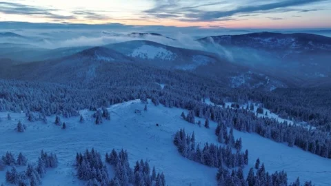 Drone orbit view of twilight mountain landscape with rolling fog Stock Footage 336365521