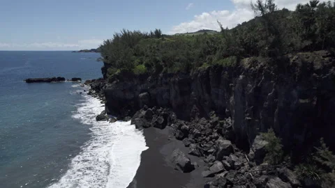 Drone Orbit of Volcanic Cliffs and Tropical Coastline in La Reunion Stock Footage 315372638
