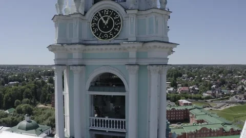 Drone orbiting bell tower while ascending upward Видео 332019017
