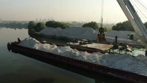Drone orbiting crane on river barge Video stock 325778837