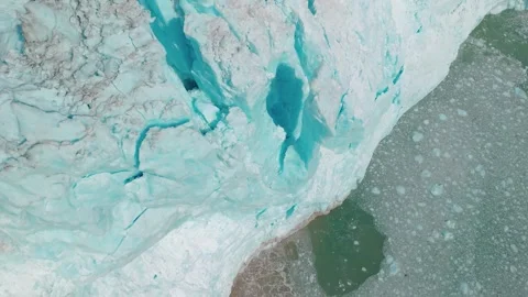 Drone Orbiting a Glacier in Alaska Beginning Calving in 4k Stock Footage 281907296