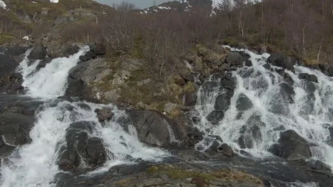 Drone Orbiting a Large Waterfall In Lofoten Stock Footage 116412769