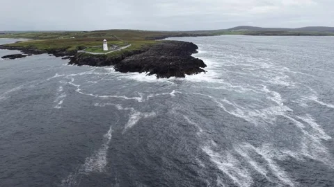 Drone orbiting the lighthouse, at Ballyglass, County Mayo, Ireland. Stock Footage 342734735