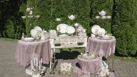 Drone orbiting near decorative tableware installation Stock Footage 329540335