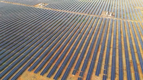 Drone Orbiting Over Massive Utility Scale Solar Farm  Aerial View of Photovo Stock Footage 338066533