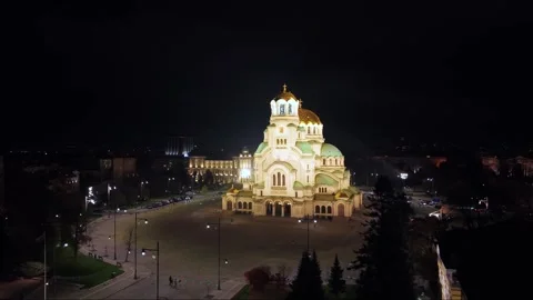 Drone Orbiting Sofia’s Central Square with Illuminated Alexander Nevsky Stock Footage 321936813