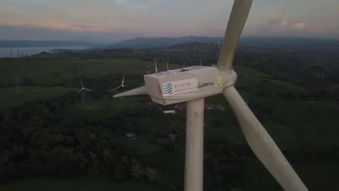 Drone Orbiting a Windmill at Sunset in Costa Rica in 4K Video stock 93872655