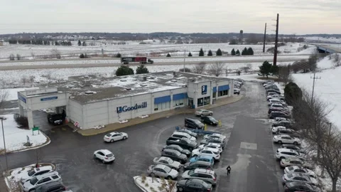 Drone Orbits Above Goodwill Industries and Donation Center on Winter Day Stock Footage 237157629