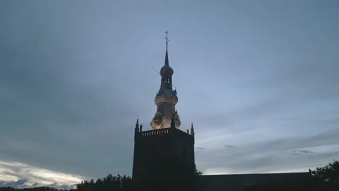 Drone orbits around and towards church tower at night Stock Footage 207370517