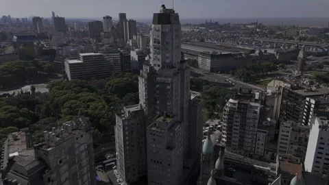 Drone orbits around backside of Edificio Kavanagh on sunny afternoon Stock Footage 297135551
