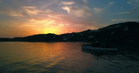 Drone orbits around a large boat during gorgeous sunset in Greece Stock Footage 101487277