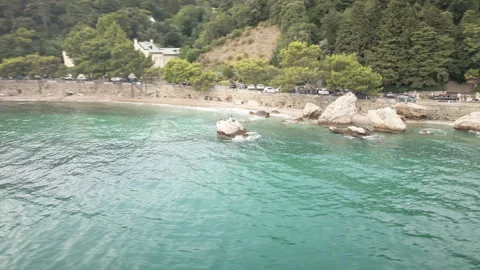 Drone Orbits over Trieste cove and rocky beach 4K 스톡 동영상 331098309