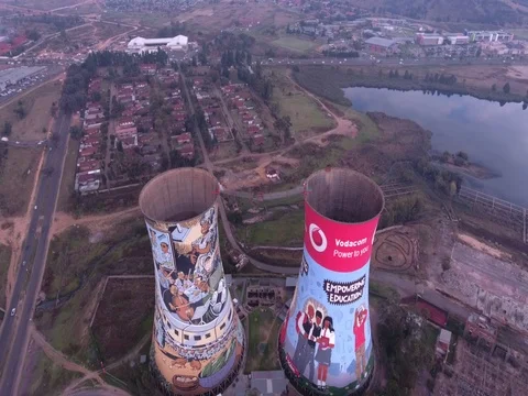 Drone orbits slowly around Soweto Towers in Johannesburg Stock Footage