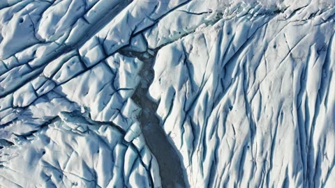 Drone Over Abstract Patterns Of Ice Of Large Glacier Stock Footage 162618775