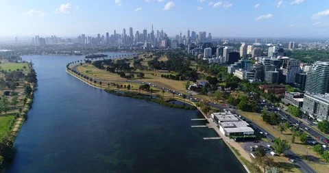 Drone over Albert Park, Melbourne City in background Stock Footage