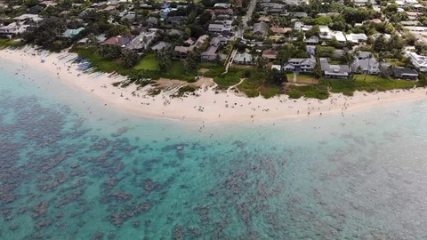 Drone over beach 4K Stock Footage 128958081