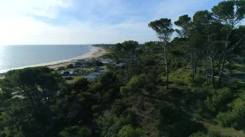 Drone over beach with jetty 4k Stock Footage 280379273