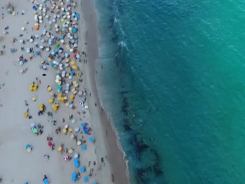 DRONE OVER BEACH UMBRELLAS RIO 스톡 동영상 78244807