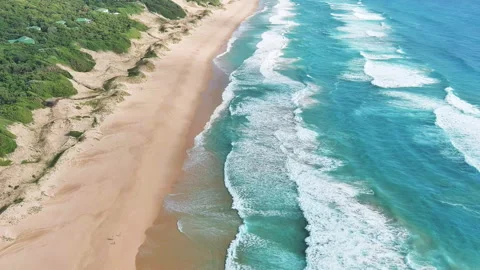 Drone over beach, waves crashing Stock Footage 304211976